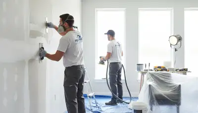 Professional drywall repair and wall restoration in Houston, TX home interior by expert painters