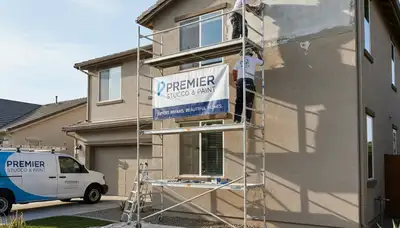 Professional stucco repair and restoration on a Houston TX home exterior by expert painters